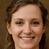 A woman with a smile on her face.