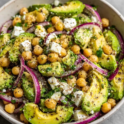 A bowl of chickpea feta avocado salad.